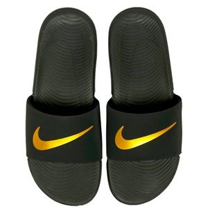 Brand New Kids black and gold Nike Slides. Price is firm.